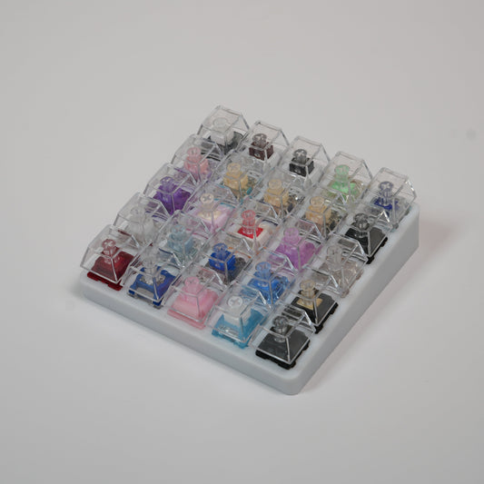 Clackify custom switch tester with 25 mechanical keyboard switches and clear keycaps